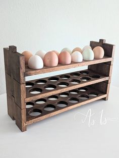 an egg rack with six eggs in it