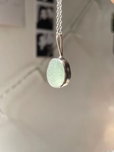 Handmade sterling silver Sea Glass necklace, made with recycled silver, and genuine Sea Glass from the Jurassic Coast. This necklace has one large piece of light blue Sea Glass, and is very dainty and elegant.  This necklace is a perfect gift for a special occasion, and is perfect for Sea Glass lovers! The chain is 18" (45cm), and has an easy closure. All of the silver on the necklace is 925 Sterling Silver, including the chain and small jump rings! Feel free to message me for any additional information, or for commissions/custom requests! Minimalist Recycled Glass Jewelry For Gifts, Untreated Sterling Silver Necklaces As Gifts, Nickel Free Recycled Glass Necklace Gift, Untreated Silver Necklace As A Gift, Minimalist Recycled Glass Necklaces For Gifts, Nickel Free Silver Necklace Of Recycled Glass, Round Recycled Glass Necklaces For Gifts, Handmade Round Jewelry From Recycled Glass, Minimalist Handmade Necklaces With Recycled Glass