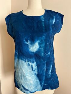 Handprinted using the cyanotype method (sun prints with large negatives), involves coating the fabric, letting it dry in the dark, and printing in sunlight), then designed and sewn. Can easily be dressed up or dressed down. Abstract print is of someone sleeping. Summer Blue Pre-washed Tops, Blue Short Sleeve Tops With Batik Print, Blue Relaxed Fit Hand Printed Top, Blue Hand Printed Top With Relaxed Fit, Blue Relaxed Fit Top With Hand Printed Details, Cyanotype Shirt, Someone Sleeping, Sun Prints, Cropped Tube Top