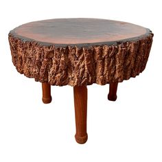 a tree stump table with wooden legs on an isolated white background