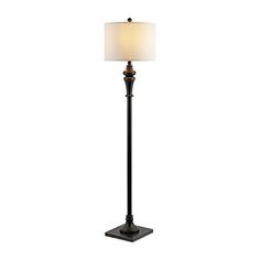 a floor lamp with a white shade on it's side and a black base