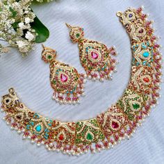 sleek Navaratna guluband set Navaratna Jewellery, 22k Gold Jewelry Necklaces, Ship Necklace, 22k Gold Jewelry, Silver Necklace Set, Pearl Necklace Set, Necklace Sets, Gold Jewelry Necklace, Emerald Necklace