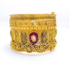 PRODUCT DETAILS Gold Purity(karat): 22k Item Weight(grams): 61.5 Item Finish: Oxidized Stone: Kundan Bangle Size: 2.5 Bangle Opening(diameter): ﻿2.3" Openable: Yes - Screw w/ Hinge Number Of Pieces: 1 Bangle 22k Gold Temple Jewelry Bracelets For Festivals, Fusion Style Ceremonial Bangle Bracelets, Traditional Yellow Gold Bangle Bracelet, Hand Set 22k Gold Festive Bracelets, 22k Gold Bangle Bracelet For Festive Occasions, Ceremonial 22k Gold Tilla Bangle, Temple Jewelry Style Ceremonial Bangle, Traditional Heavy Brass Bangle, Festive 22k Gold Bangle Bracelet