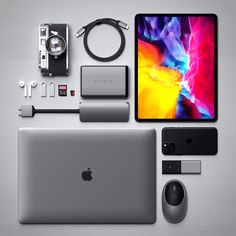 an apple macbook pro is shown with accessories