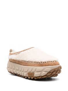 UGG Venture Daze Cozy slippersPolyethylene Sole: Rubber 100%, Polyethylene vinyl acetate (PEVA) 100% Outer: Recycled Polyester 100%, Sheep Skin/Shearling 100% Lining: Recycled Polyester 100% Ugg Sneakers, Bold Shoes, Cozy Slippers, Formal Loafers, Suede Slippers, Planet People, Embroidered Trim, Recycled Polyester Fabric, Slippers Cozy