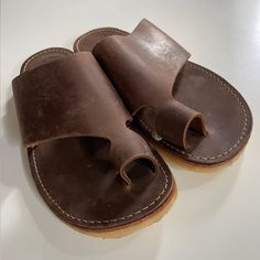 Perfect Condition Duckfeet Mand Sandals In Cocoa Leather. Nwt, No Box. Soles Are In Pristine Condition. Size 38 (7.5 W), Unisex. Sold From Nonsmoking, Cat-Friendly Home. For Warm Weather Days, The Mand [Man-Doe] Sandal Gives You A Look Like No Other. Unique Toe-Post And Wide Leather Strap Securely Holds Your Foot In Place While Keeping You Light And Airy All Summer Long. Casual Toe Ring Sandals With Heel Loop, Brown Closed Toe Sandals With Rubber Sole, Brown Closed Toe Ring Sandals With Rubber Sole, Rubber Sole Toe Ring Sandals For Beach, Brown Leather Toe Ring Sandals With Round Toe, Brown Toe Ring Sandals With Leather Sole, Duckfeet Shoes, Weather Day, Cat Friendly Home