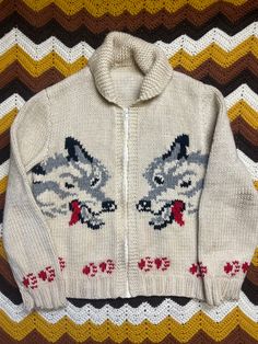 "Authentic vintage 'Wolf Cowichan' sweater. Thick wool. Zippered closure . Double wolf on front & back.  Paw prints. Some colour leakage (photographed) Some wear & tear on both cuffs. Pictured. Measurements ! Please measure to ensure fit. Fits approximately Medium Mens Shoulder to shoulder- 18\" Pit to pit - 22.5\" Sleeve- 25\" Length - 25.5\"" Funky Men Outfits, Vintage Wool Outerwear With Fair Isle Pattern, Vintage Wool Crew Neck Outerwear, Vintage Wool Outerwear With Crew Neck, Funky Sweaters, Cowichan Sweater, Cowboy Belt Buckles, 1950s Mens, Thick Wool