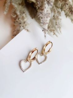 Beautiful and lightweight, these elegant heart earrings are great for every outfit or event.  16 MM gold plated hoop huggies  CZ heart charms/14K gold plated Hearts Earrings, Gold Huggies, Gold Heart Earring, Gold Hearts, Earrings Heart, Snowflake Earrings, Valentines Day Gifts, Heart Jewelry, Everyday Jewelry