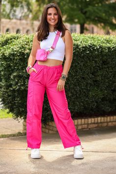 Our "Cargo Girl Pants" are light weight, hot pink cargo pants. They have functioning front pockets and a drawstring at the bottom to make them cinched. Our model is wearing a size Small. Pink Hiphop Outfit, Pink Satin Cargo Pants Outfit, Hot Pink Cargo Pants Outfit, Light Pink Cargo Pants Outfit, Hiphop Costume, Hot Pink Cargo Pants, Cute Cargo Pants Outfits, Pink Cargo Pants Outfits, Cargo Pants Outfit Aesthetic