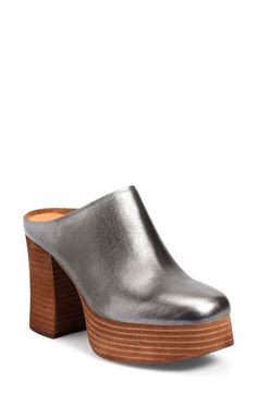 A stacked platform and chunky block heel elevate a rich leather mule set on a cushioned footbed for long-lasting wear. 4" heel; 1 1/2" platform(size 8.5) Cushioned footbed Leather upper/textile lining/rubber sole Imported Modern Leather Clogs With Padded Heel, High Heel Platform Mules For Workwear, Formal Platform Clogs With Block Heel, Formal Clogs With Platform Block Heel, Chic Closed Toe Clogs With Chunky Platform, Formal Mules With Reinforced Wedge Heel, Formal Platform Clogs, Platform Mules With Block Heel In Medium Width, Chic Clogs With Padded Block Heel