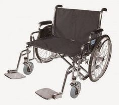 a wheelchair with wheels and footrests is shown