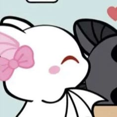 two cats are kissing each other with hearts in the background