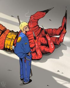 a man standing in front of a giant dead lobster on the ground next to him