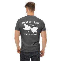 Celebrate Wisconsin's Pickerel Lake! Black - 100% cotton Heather - 50% cotton, 50% polyester Back print Size guide LENGTH (inches) WIDTH (inches) SLEEVE LENGTH (inches) S 28 18 15 ⅝ M 29 20 17 L 30 22 18 ½ XL 31 24 20 2XL 32 26 21 ½ Pre-shrunk Cotton Camp Shirt For Outdoor Activities, Pre-shrunk Cotton Camp Shirt For Camping, Cotton Crew Neck Camp Shirt With Graphic Print, Casual Cotton Camp Shirt For Camping, Casual Cotton Camp Shirt, Cotton Graphic Tee Camp Shirt With Short Sleeves, Pre-shrunk Cotton Camp Shirt For Outdoor, Cotton Graphic Tee For Camping, Outdoor Cotton Top