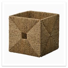 a basket made out of straw with a square design on the front and bottom side