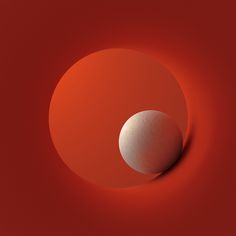 an egg is sitting in the center of a red circle with light coming through it