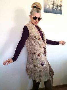 I designed and constructed this M size beige sleeveless cardigan.This boho chic vest can be worn every day or when you want to feel good and one of a kind.Length - 89 cm/ 35 inches Bust - 102 cm/ 40 inchesHips - 107 cm/ 42 inchesI used beige knit cotton blend sleeveless cardigan, laces,velvet,tulle,Preciosa glass beads, sequins..This embroidered fleece jacket is NOT STRETCHY !!!! Floral Spring Cardigan M Embroidered Knit Vest Machine wash on a gentle or wool program!!!!All my items are ready to ship within 1-3 working days. You will receive them in a special box or an envelope/protected with bubble wrap material inside/ of the Bulgarian National Post.I also add a special gift bag, handmade by me.This knit casual cardigan jacket is exclusive, one of a kind, because I don`t make more than on Sleeveless Beige Cardigan For Fall, Beige Sleeveless Cardigan For Fall, Bohemian Knit Sleeveless Vest, Bohemian Spring Vest For Layering, Bohemian Vest For Spring Layering, Bohemian Vest For Fall Layering, Beige Embroidered Bohemian Cardigan, Bohemian Knit Sweater Vest For Fall, Beige Bohemian Embroidered Cardigan