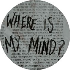 the words where is my mind? written in black ink on an old book page