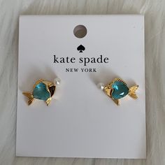 Kate Spade What A Catch Fish Stud Earrings *New With Tags *Gold-Tone Stud Earrings *Gold-Tone Fish With Blue Crystal Fish Body And Pearl Bubble *Approximate Dimensions: 0.5" X 0.25" *Unbelievably Cute Piece Blue Fish-shaped Earrings For Gift, Elegant Blue Kate Spade Jewelry, Fish Jewelry, Earrings Summer, Earrings In Gold, Spade Jewelry, Kate Spade Jewelry, Blue Crystals, Gold Earrings Studs