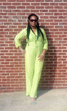 This striking jumpsuit boasts long sleeves, a plunging V-neck in the front and back, and flowy wide legs for a stunning and stylish look! Model is wearing a Medium (Height: 5'5", Waist: 33", Hips: 44", Bust: 39") Material: 100% Polyester The material is very stretchy. Inseam: 33" Color: Lime Casual Work Attire, Next Clothes, Long Jumpsuits, Wide Legs, Work Attire, Chic Woman, Wide Leg Jumpsuit, Work Casual, Quality Clothing