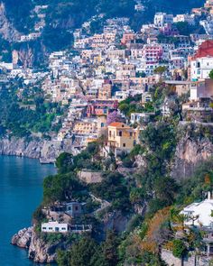 an aerial view of a city on the edge of a cliff