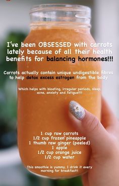 a person holding up a jar with carrots in it and the words i've been obsesed with carrots lately