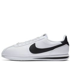 First designed in 1972 by Bill Bowerman, the Nike Cortez has been a iconic silhouette in the world of sneakers. The Cortez Basic Leather is a modern take on the classic design, with a white leather upper and visible stitching. The low-cut collar ensures flexible movement, and the EVA wedge midsole provides responsive cushioning. The herringbone pattern on the outsole adds durability, and the black accents on the Swoosh, heel, and tongue tab give this sneaker a modern edge. (SNKR) Classic White Sneakers With Branded Insole, Classic White Low-top Sneakers, Classic Nike Sneakers With Contrast Sole, Nike Modern Custom Sneakers With Vulcanized Sole, Modern Nike Custom Sneakers With Vulcanized Sole, Nike Custom Sneakers With Vulcanized Sole, Nike Modern Custom Sneakers With Gum Sole, Modern Nike Custom Sneakers With Gum Sole, Classic Nike Custom Sneakers With Rubber Sole