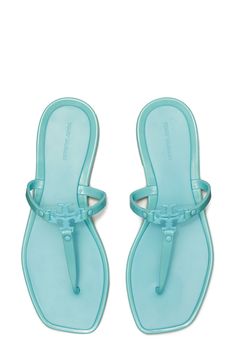 Make a playful retro statement with this carefree jelly sandal topped with polished logo hardware. Flat sole Synthetic upper, lining and sole Imported Pretty Heels, Miami Outfits, Tory Burch Sandals, Beach Wear Outfits, Pretty Shoes Sneakers, Latest Shoe Trends, Fasion Outfits, Blue Island, Jelly Sandals