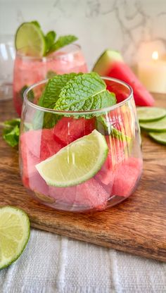 watermelon, lime and mint mojitas in glasses on a cutting board