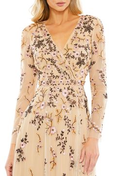 Beautiful floral embroidery stands out against the inky tulle of a romantic midi dress with semisheer sleeves and surplice neck. 46" length Surplice V-neck Long sleeves Lined, except sleeves 100% polyester Spot clean Imported Asian Owned/Founded Short Wedding Guest Dresses, Floral Cocktail Dress, Unique Prom Dresses, Embroidered Midi Dress, Semi Formal Dresses, Floral Embroidered Dress, Short Cocktail Dress, Tulle Gown, Dreamy Dress