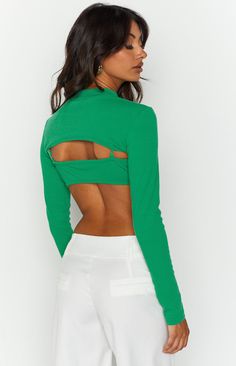 * Green Long Sleeve Cropped Top 
 * Sporty and cute! Run errands looking like a 10 out of 10 in this green crop top ()! Style with white baggy pants () and sneakers () for that off duty look! 
 * 
 
 * High neckline 
 * Long sleeves 
 * Thin shoulder straps on crop top are adjustable 
 * Unlined 
 * Light-weight, ribbed material with stretch 
 * Please note: crop top and bolero are attached together Long Sleeve Cropped Top, Crop Top Style, Prom Midi Dress, Summer Playsuit, Green Crop Top, Rib Top, Sweater Crop, Green Long Sleeve, Strapless Tops