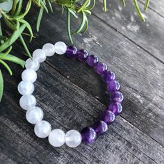 New Authentic Amethyst And White Quartzite Bracelet 8 Mm Round Stones Semi Precious Beads Made With 8 Mm Stretch Cord Hand Made Buy 2 Get 1 Free! White Beaded Crystal Bracelet For Healing, White Beaded Crystal Healing Bracelet, White Crystal Bracelet With Gemstone Beads For Healing, White Beaded Amethyst Jewelry, Adjustable White Gemstone Bracelet, White Amethyst Beaded Gemstone Bracelets, Adjustable White Gemstone Crystal Bracelet, White Gemstone Beaded Bracelets For Healing, White Amethyst Beaded Bracelets For Spiritual Style