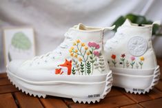 "Experience the art of hand embroidery on Converse embroidered shoes, a testament to meticulous craftsmanship."          Embroidered Converse High Tops Fox, Mushroom And Flower Garden/ Custom Converse Run Star Hike Twisted Foundational Embroidered Shoes  💸 Price includes Converse Shoes and floral embroidery as shown 🌸 You can send me your Converse/Vans shoes or I can buy them for you. We stock all the Converse and Vans shoes you want, if you want other Converse/Vans shoes in the store, please message us. Your embroidered Converse/Vans shoes will be available for shipping in 7-15 days. 🌸 I started hand embroidering on fashionable clothes and handbags over 20 years ago - and now on CONVERSE/VANS shoes, an American icon, a must-see classic! I'm excited to give your Chuck Taylor shoes a new Embroidery On Converse, Embroidered Converse High Tops, Converse Chuck 70s, Chuck Taylor Shoes, Embroidered Converse, Converse Run Star Hike, Converse Run, Run Star Hike, Converse Run Star