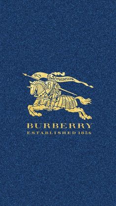 the blue and gold logo for burberry, which is located on top of a building