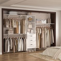 an open closet with clothes and shoes on shelves next to a bed in a room