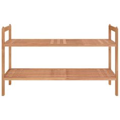 a wooden shelf sitting on top of a white wall