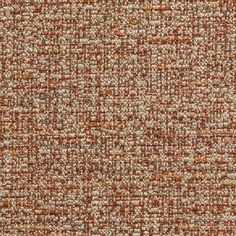 an orange and white tweed fabric textured with small squares on the top, as well as