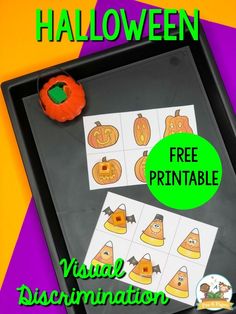 a black tray with halloween themed printables on it and the words, free printable visual recognition