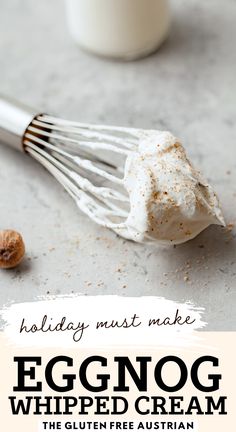 eggnog whipped cream in a whisk on a table