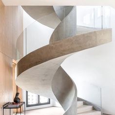 a spiral staircase in the middle of a room