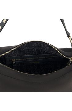 Keep your valuables safely stashed in this street-savvy shoulder bag featuring a signature horseshoe stud and gleaming chain-trimmed strap. 6 1/4"H x 11 1/2"W x 4"D Top zip closure Shoulder strap Textile Lining Imported Black Bags With Metal Hardware For On-the-go, Black Rivet Shoulder Bag, True Religion Belt, True Religion Bag, Luxury Shoulder Bag With Gunmetal Hardware For On-the-go, Sam Edelman Shoes, Clutch Pouch, Flip Flop Slippers, Fall Kids