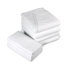 a stack of white sheets sitting on top of each other