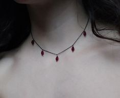 Artemis Dreaming. Βeauty and magic in the most delicately dark way. This necklace is composed of black rhodium over 925 sterling silver delicate sparkling chain and 5 tiny burgundy agate drops. You can choose between these chain lengths: 15 / 16 / 17 / 18 inches Not sure which length to buy? We can add a 1 inch extender chain. Just write a note at checkout! ❈ We send all our items with registered mail. ❉ Due to the organic nature of stones, there might be a slight variation in colour, size and shape. ✺ All items come packaged in a quality velvet pouch ready for gift giving. ✽ If you want to make a special order, just contact us! Gothic Dangle Necklaces As Gifts, Gothic Dangle Necklaces For Gifts, Gothic Sterling Silver Necklaces For Parties, Gothic Dangle Necklace For Gift, Handmade Teardrop Pendant Jewelry For Party, Wire Wrapped Drop Jewelry For Party, Witchy Choker Necklace Gift, Dainty Drop Necklaces For Party, Handmade Witchy Necklace For Party