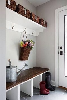 the entryway is clean and ready to be used as a storage area for pots and pans