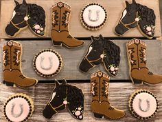 decorated cookies in the shape of horses and boots