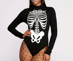 Keep is spooky and sultry in a bodysuit that is bad to the bone this Halloween. The bodysuit features a mock neck. fitted long sleeves. and a spooky skeleton bone graphic design. Complete your Halloween costume with stunning face gems. fishnets. and thigh-high boots.Fit & Features Mock neck Fitted long sleeves Zippered front Skelton bone graphic design Cheeky bottom Snap button closure Cotton knit fabric. moderate stretch Model is 5'8" with a 32" bust. 23" waist and 35" hips. She is wearing a size small.Halloween Costumes are excluded from Promotions. Skeleton Bodysuit, Spooky Skeleton, Mock Neck Bodysuit, Face Gems, To The Bone, Skeleton Print, Bad To The Bone, Fishnet Tights, The Bone