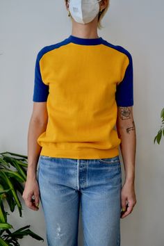 "Vintage 1960s Blue And Yellow Colour Block Sweatshirt Tee. 100% Cotton Excellent Vintage Condition Tag Size Medium Chest - 38\" Waist - 31\" Length - 25\" All Sales Are Final. We have taken the time to note all size measurements and the condition of each piece so please look over all the information of the garment you are considering purchasing. Please note that all items are sold in \"Vintage Condition\". If you have any further questions about the piece please feel free to contact us.  Excell Color Block Fashion, Vintage Military Jacket, Linen Wrap Top, Terry Cloth Romper, Colour Blocking Fashion, Color Blocking Outfits, Color Block Tee, Color Block Sweatshirt, Yellow Colour