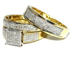 two gold rings with white diamonds on top of each other and one has a square shaped band