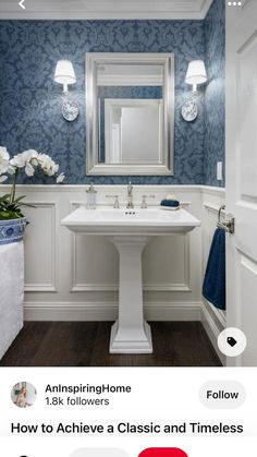 a bathroom with blue and white wallpaper is featured in the home design magazine's website