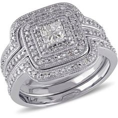 two pieces of white gold and diamond ring set with square shaped diamonds on each band